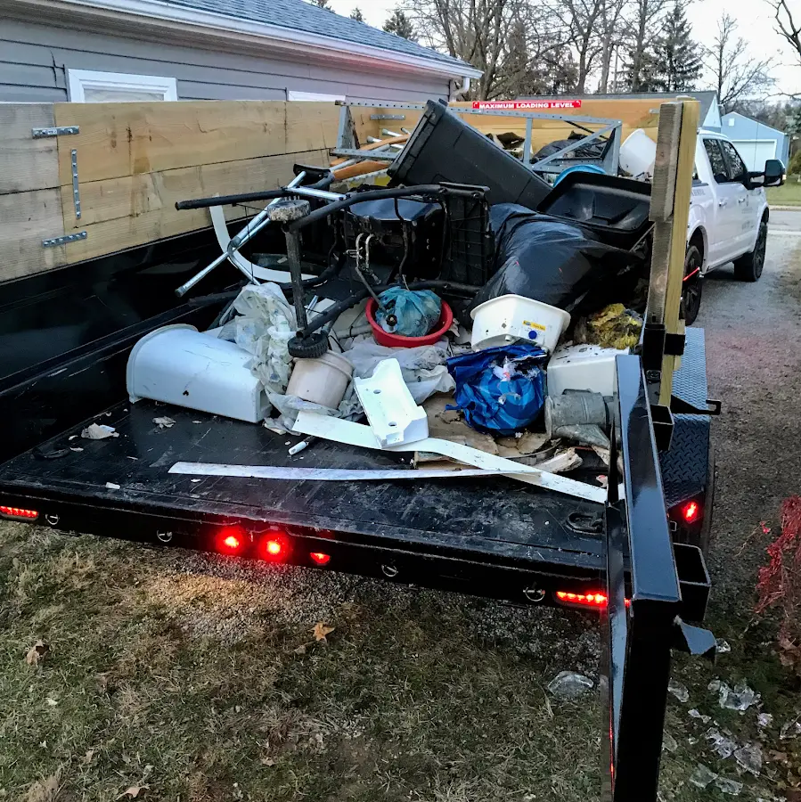 Roll-off dumpster delivered to a residential driveway in Viroqua